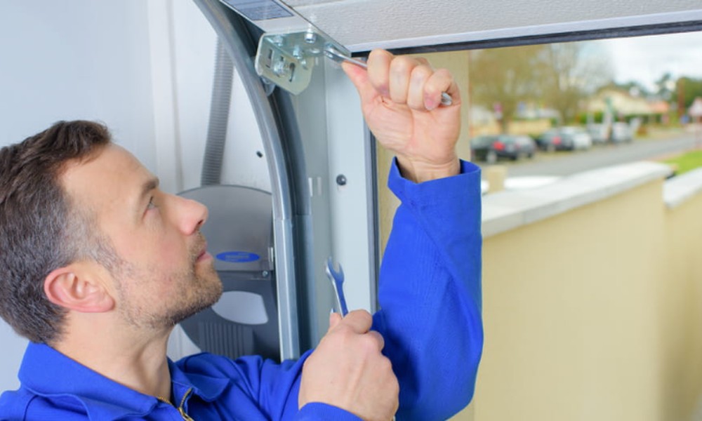 When Your Garage Door Drops Too Fast: Why You Should Call a Professional?